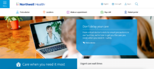 Homepage of the Northwell Health website features a blurred image of a person looking at a laptop screen displaying a virtual doctor - healthcare websites