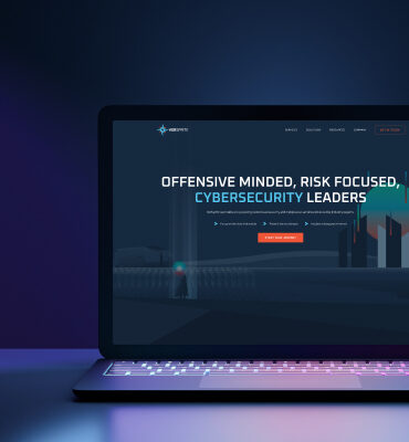 Web Design and Development for VerSprite showing a laptop displaying dark-themed cybersecurity information